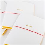 White, yellow and gold embossed Finally notebook