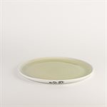 Porcelain dinner plate with green interior