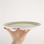 Porcelain dinner plate with green interior