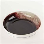 Porcelain pasta bowl with red and green interior