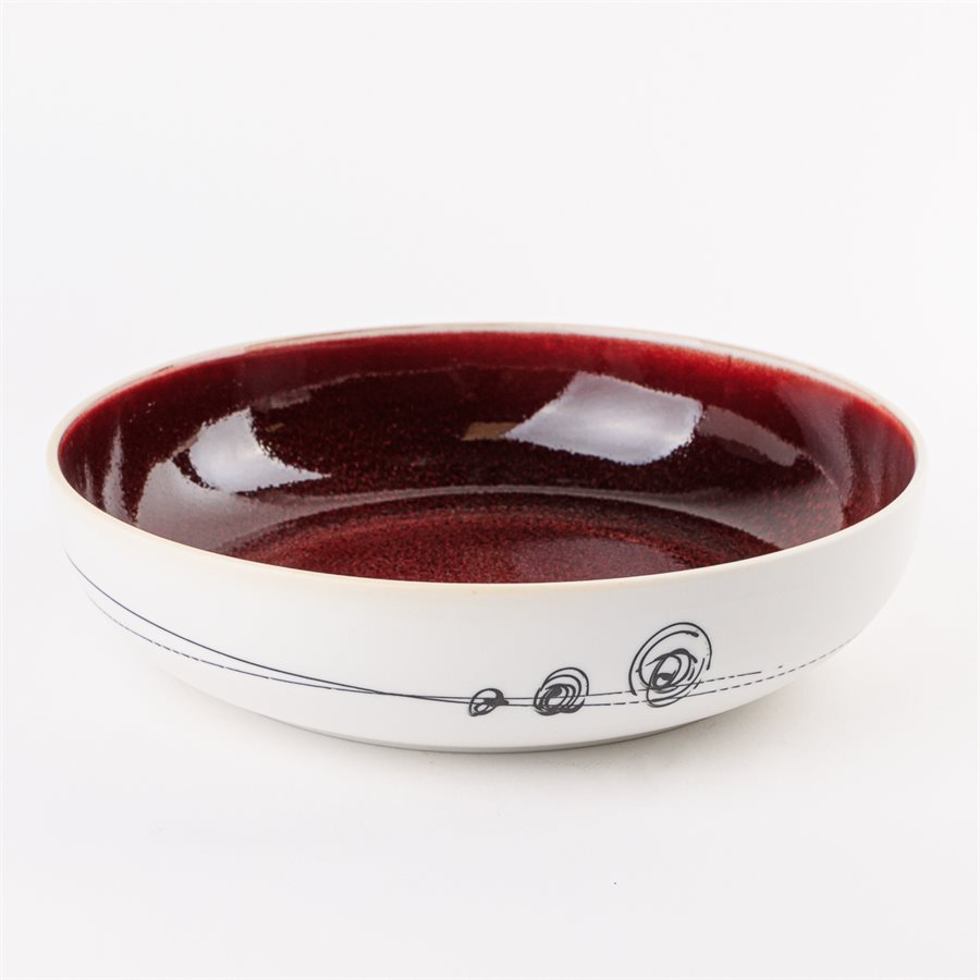 Porcelain pasta bowl with red interior