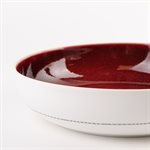 Porcelain pasta bowl with red interior