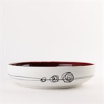 Large porcelain serving bowl with red interior