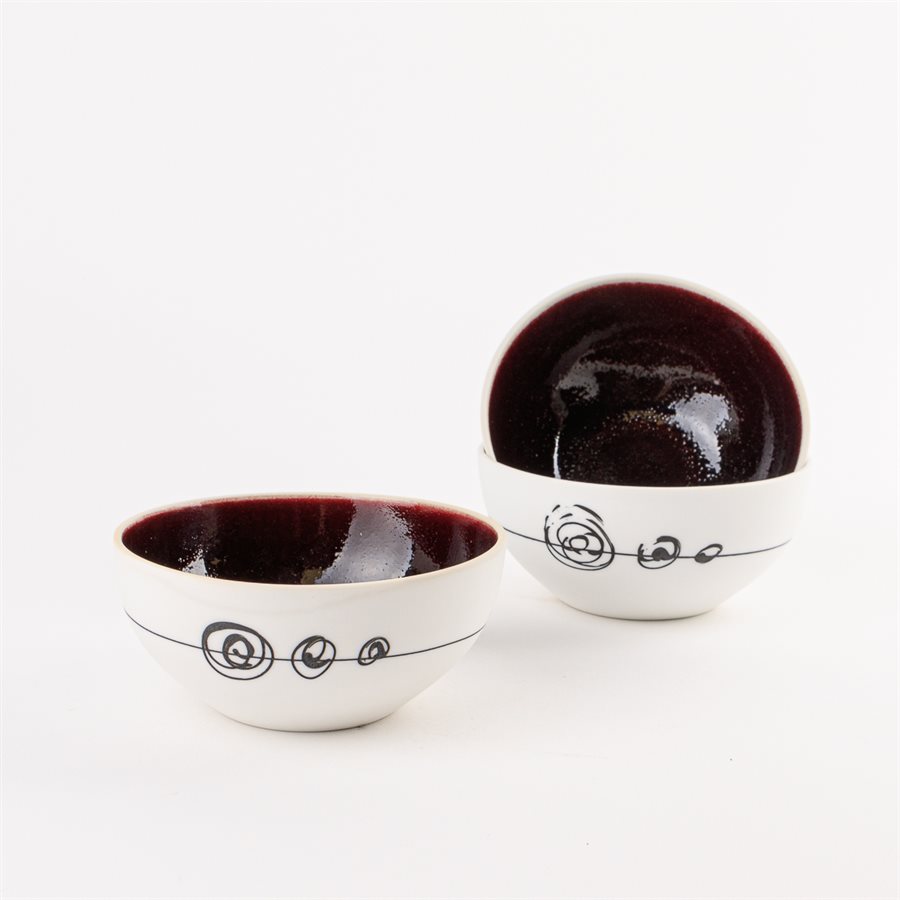 Small round porcelain bowl with red interior