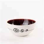 Small round porcelain bowl with red interior