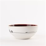 Small round porcelain bowl with red interior