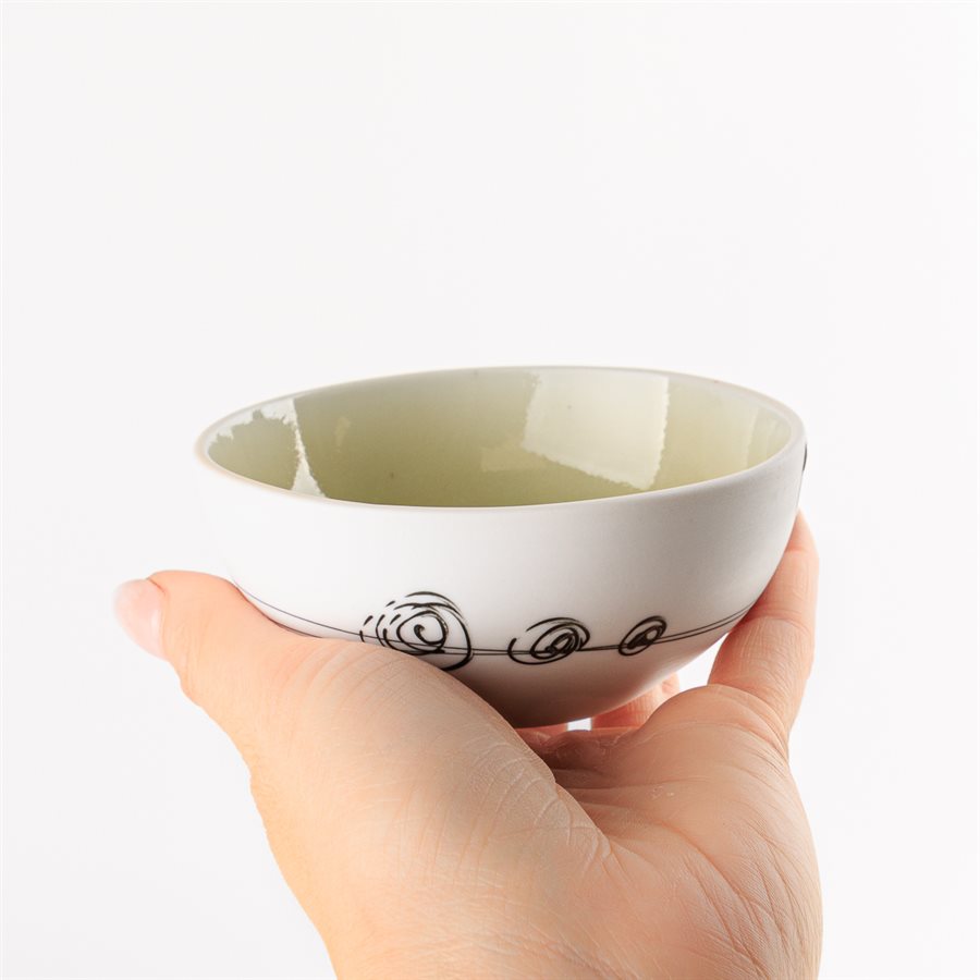 Small round porcelain bowl with green interior Small round porcelain bowl with green interior
