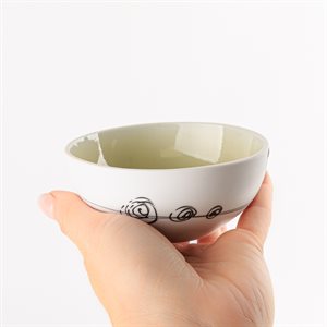 Small round porcelain bowl with green interior