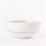 Small round porcelain bowl with green interior