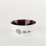Small flared ceramic bowl with red interior