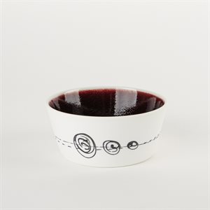 Small flared ceramic bowl with red interior