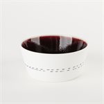 Small flared ceramic bowl with red interior