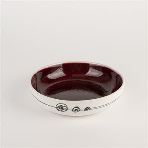 Small porcelain pasta bowl with red interior
