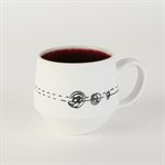 Miniature porcelain cup with red interior
