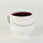 Miniature porcelain cup with red interior