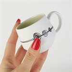 Miniature porcelain cup with green interior