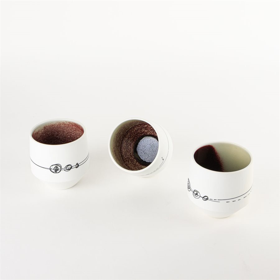 Gas-fired porcelain wine glass with red and green interior