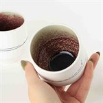Gas-fired porcelain wine glass with red and green interior