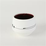 Miniature porcelain tumbler with red interior