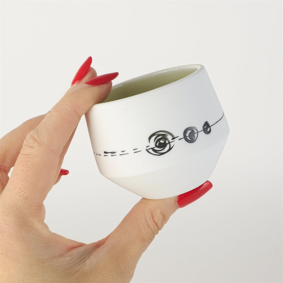 Miniature porcelain tumbler with green interior