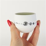 Miniature porcelain tumbler with green interior