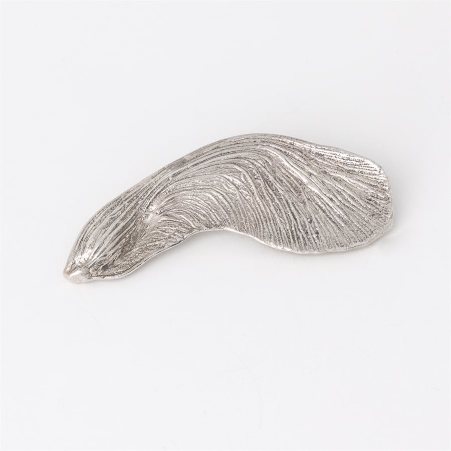 Silver samara brooch