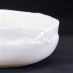 Moyen bol en porcelaine pincée blanche