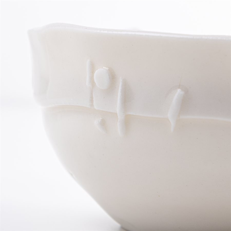Petit bol en porcelaine pincée blanche Petit bol en porcelaine pincée blanche