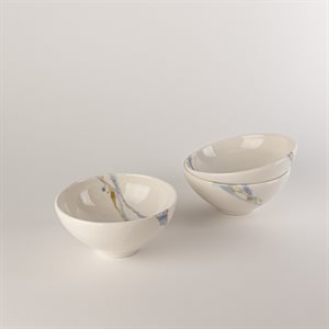 Petit bol en céramique blanc et bleu avec effet ambré