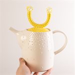 Ceramic teapot and glass ornaments
