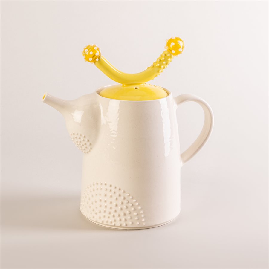 Ceramic teapot and glass ornaments Ceramic teapot and glass ornaments