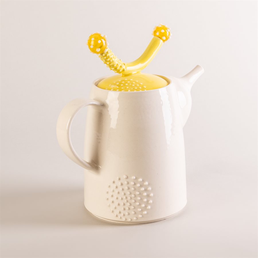 Ceramic teapot and glass ornaments Ceramic teapot and glass ornaments