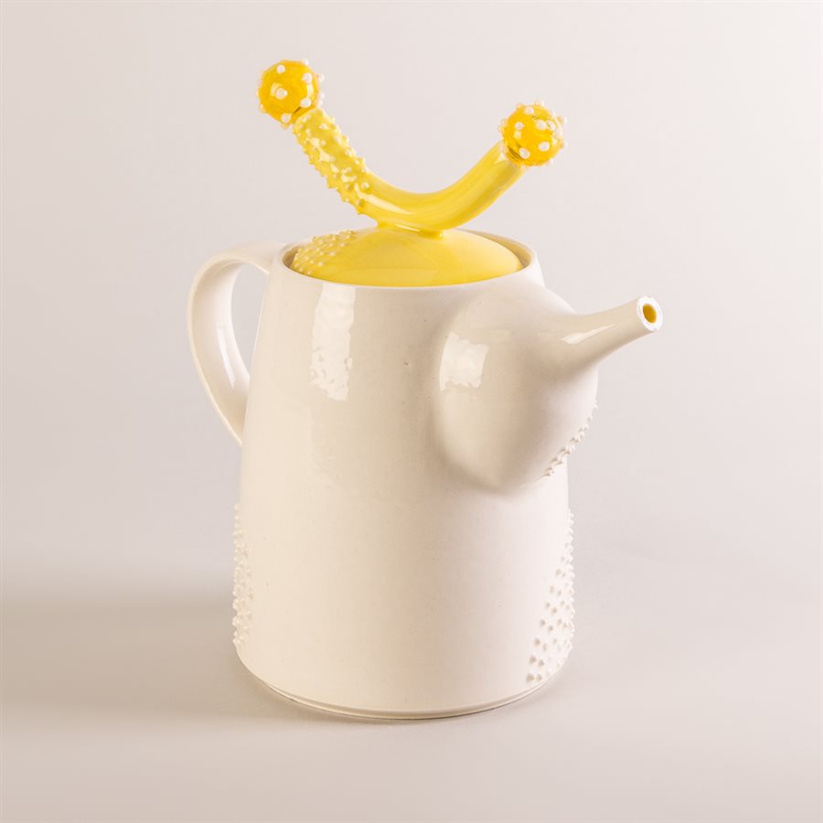 Ceramic teapot and glass ornaments Ceramic teapot and glass ornaments