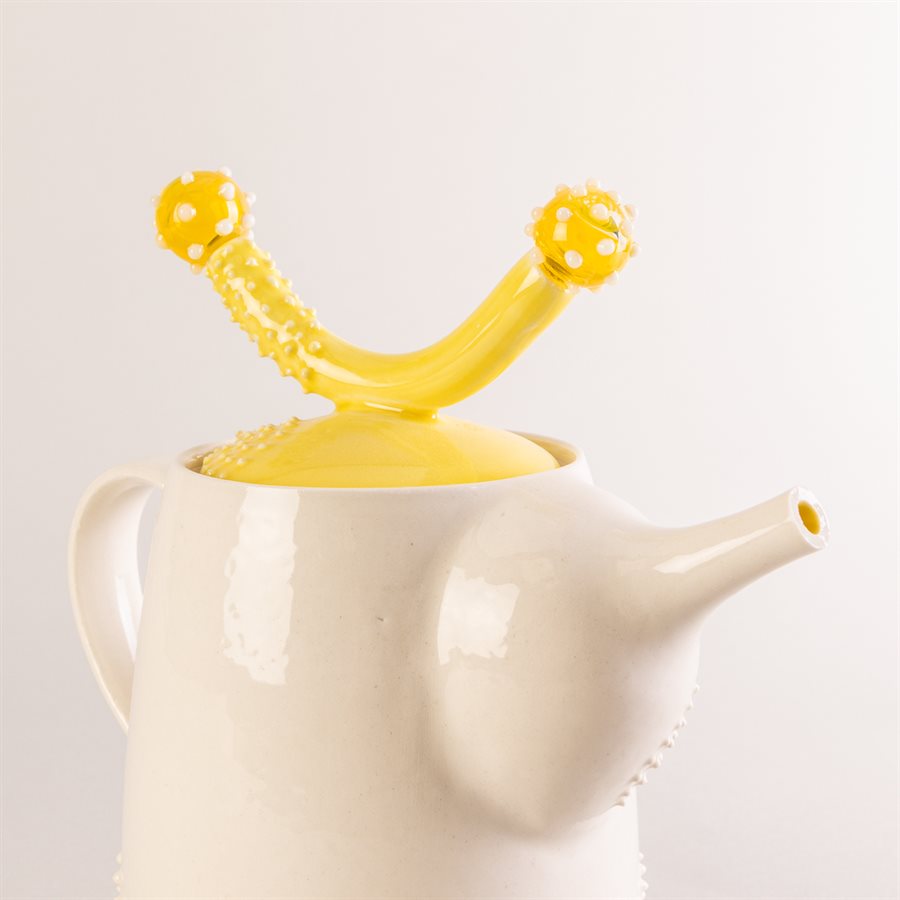 Ceramic teapot and glass ornaments Ceramic teapot and glass ornaments