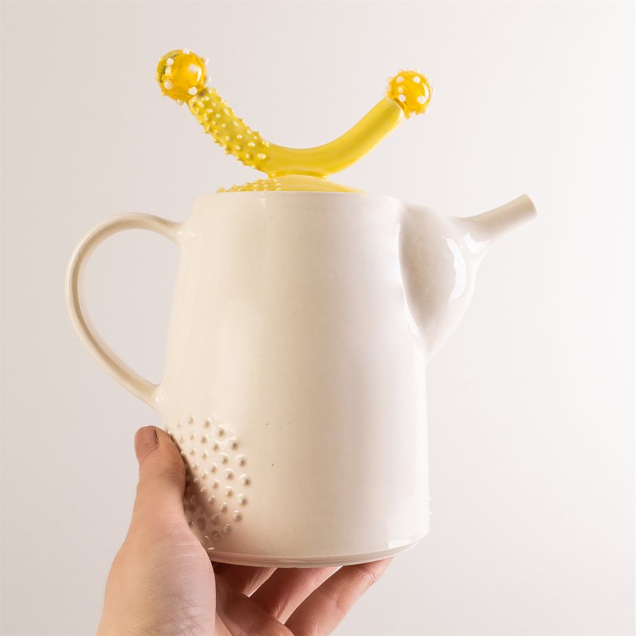 Ceramic teapot and glass ornaments Ceramic teapot and glass ornaments