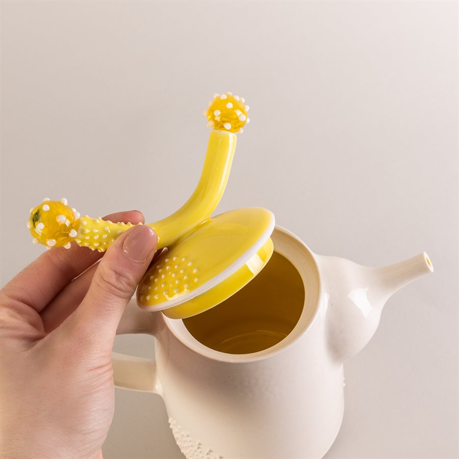 Ceramic teapot and glass ornaments Ceramic teapot and glass ornaments