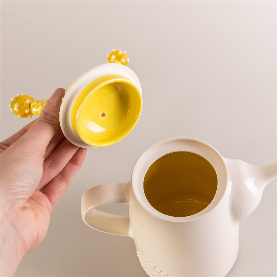 Ceramic teapot and glass ornaments Ceramic teapot and glass ornaments