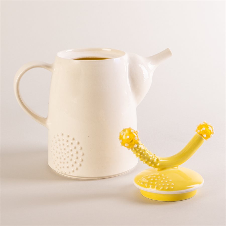 Ceramic teapot and glass ornaments Ceramic teapot and glass ornaments