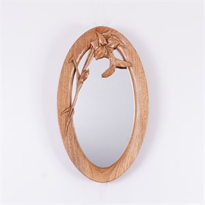 Oval mirror, carved wood frame