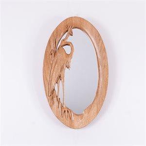 Miroir ovale en bois sculpté