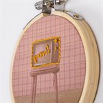 Small wall embroidery on printed textile - Television