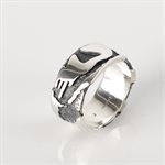 Wide bangle with engraved half skull effect