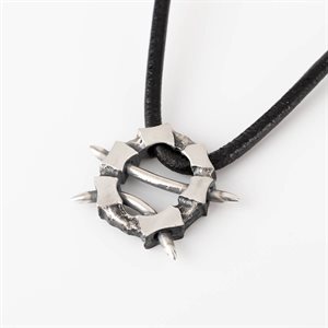 Round silver pendant on claw effect leather cord